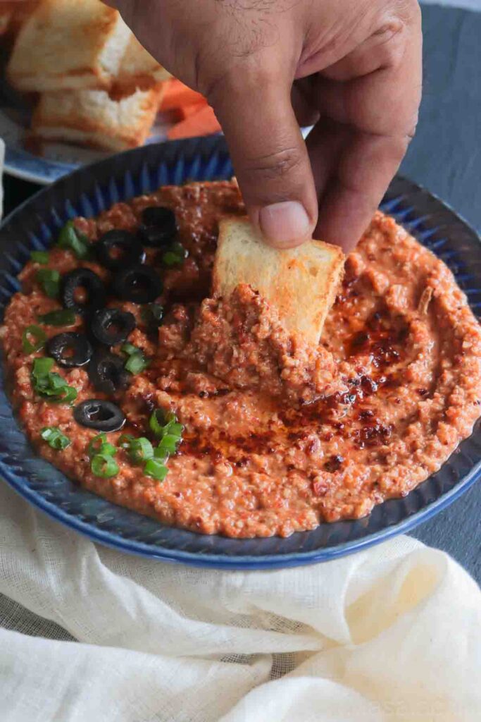 Muhammara served with toasted bread