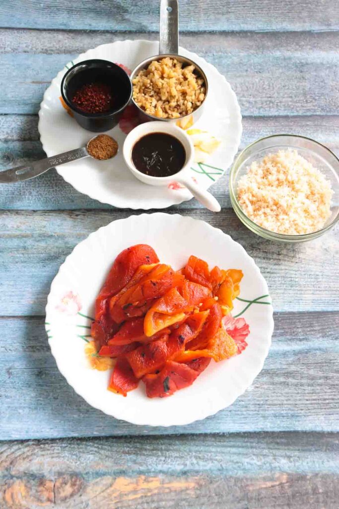 Ingredients for Muhammara - Roasted Peppers, Bread Crumbs, walnut, cumin, pepper flakes and balsamic-lemon juice-honey mixture