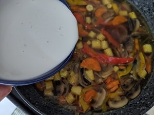 Coconut Milk added to tom Kha Soup