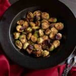 Black Bowl with roasted Brussels sprouts and dried cranberries