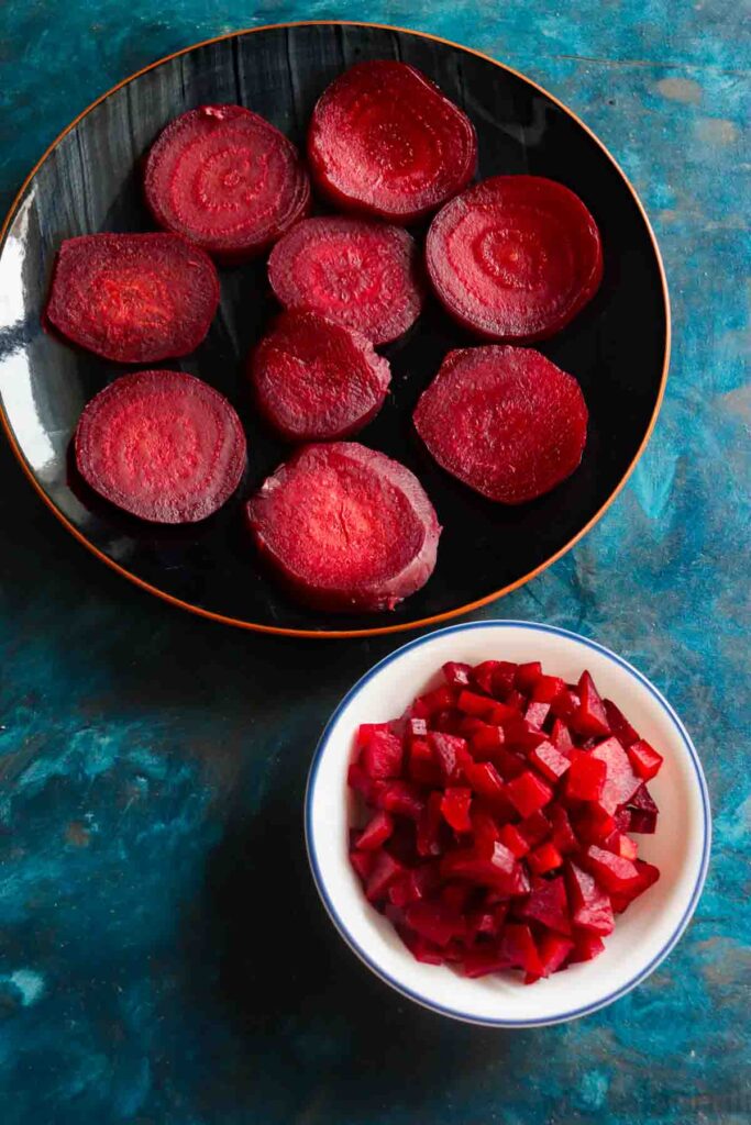 Black Plate with Sliced Beets and White bowl with chopped beets