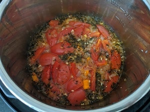 Pressure Cooked Tomatoes and herbs ready to be blended into soup