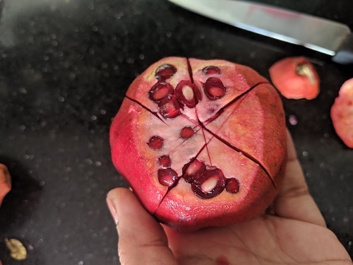 Pomegranate cut in 4 quarters