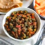 Bhindi Masala or Indian Okra Stir Fry served with chapati and carrot sticks