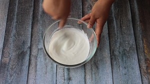 Whisking the curd for lump free pachadi