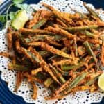 Air Fryer Crispy Okra served with a lime wedge