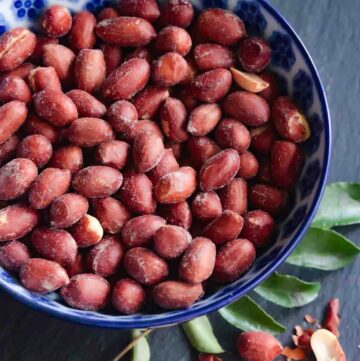 crunchy roasted air fryer peanuts served in a blue bowl