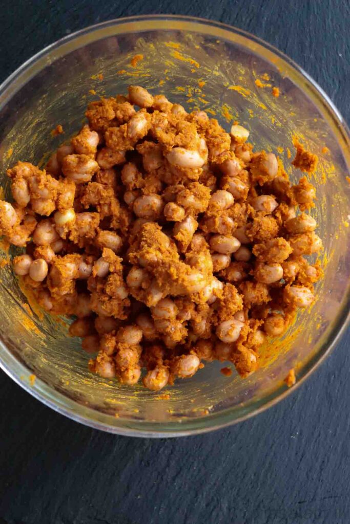 peanuts coated with spices, gram flour, oil and water