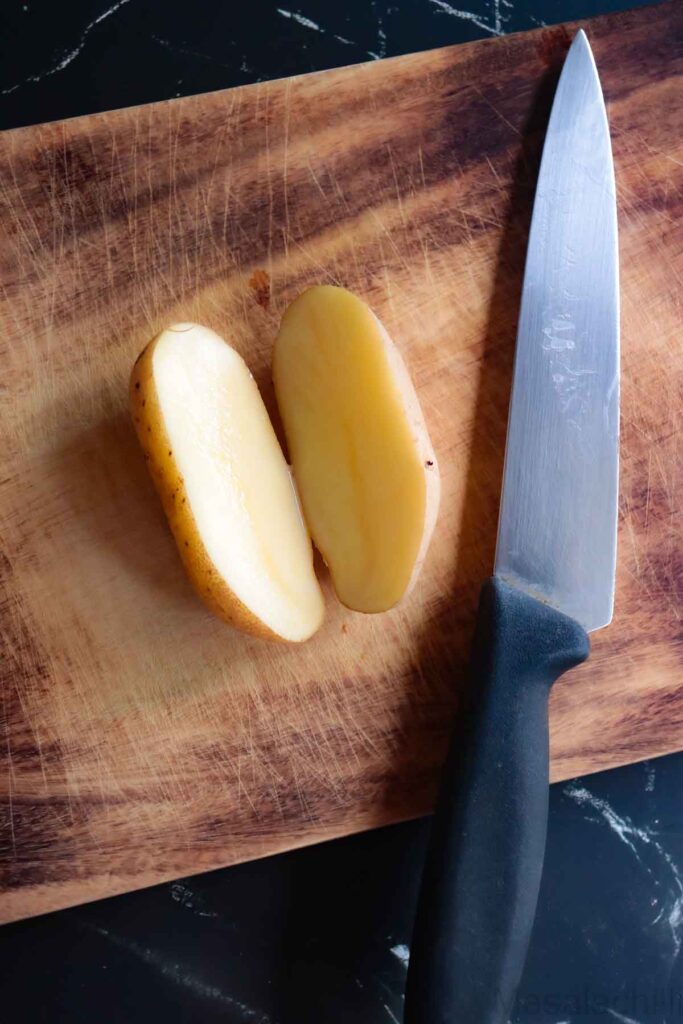 Potato cut into half, lengthwise
