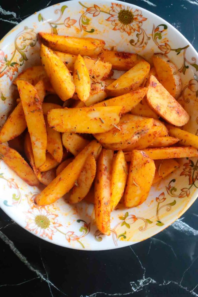 wedges coated with spices and salt