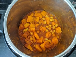 butternut squash and chickpea cooked in an onion tomato gravy