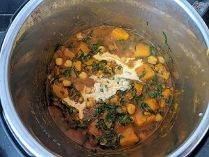 coconut milk added to the curry
