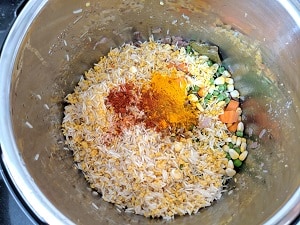 Basmati rice, lentils, spices and vegetables added to the instant pot