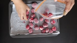 pack the strawberries in freezer safe bags in small portions