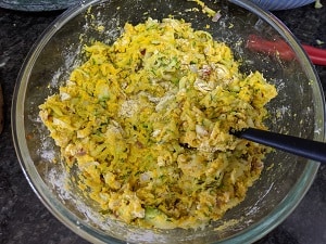 making the batter for zucchini fritters