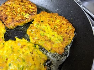 zucchini fritters crispy on the edges with a soft center